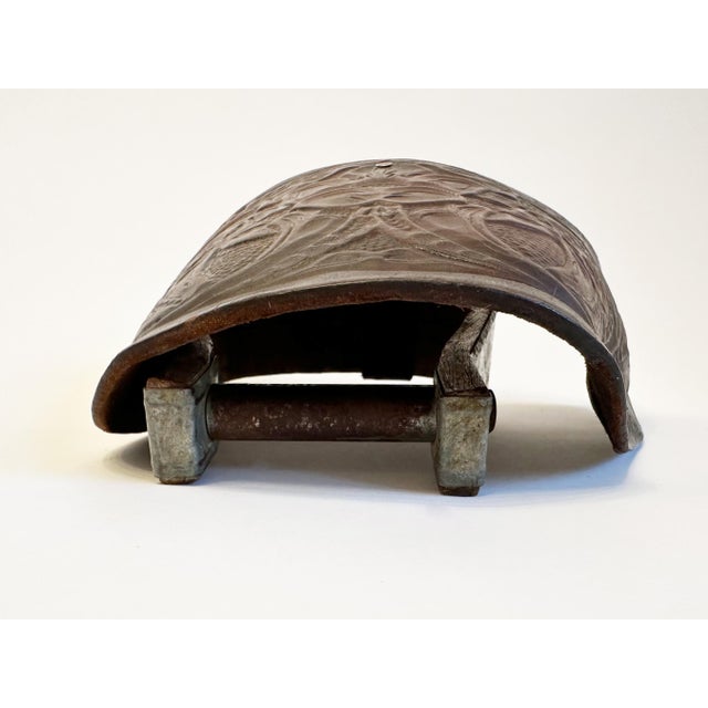 Add texture and character to your southwest or eclectic décor with this single antique tooled leather western horse saddle...