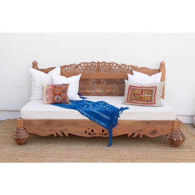 Channeling the relaxed grandeur of an ancient Balinese Royal Pavilion, this daybed is more than furniture—it is an escape....