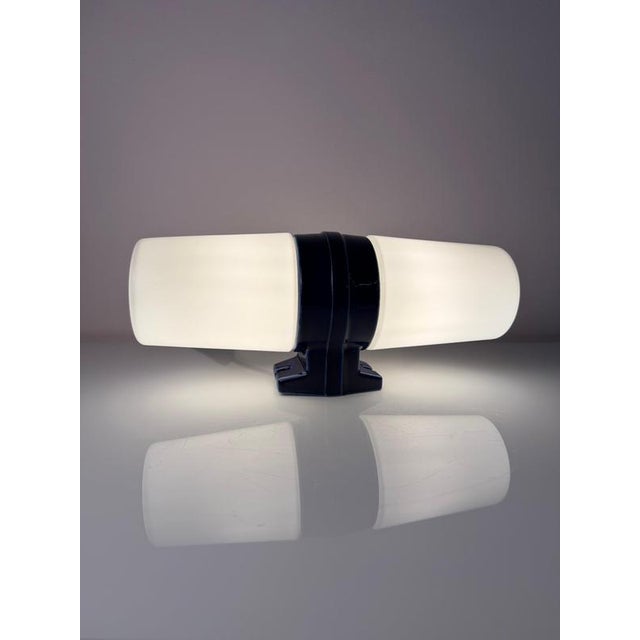 A scandinavian design classic in a rare color: the large double wall lamp, model 6065, was designed by the renowned...