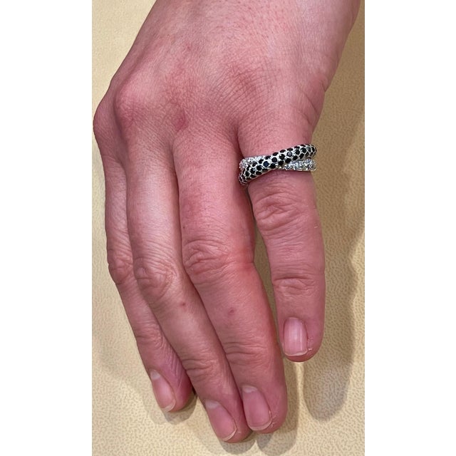 0.8 Ct Black & 0.7 Ct White Diamond Cross Over Band 18 Karat White Gold Diamond weights are approximate. Diamond VS...