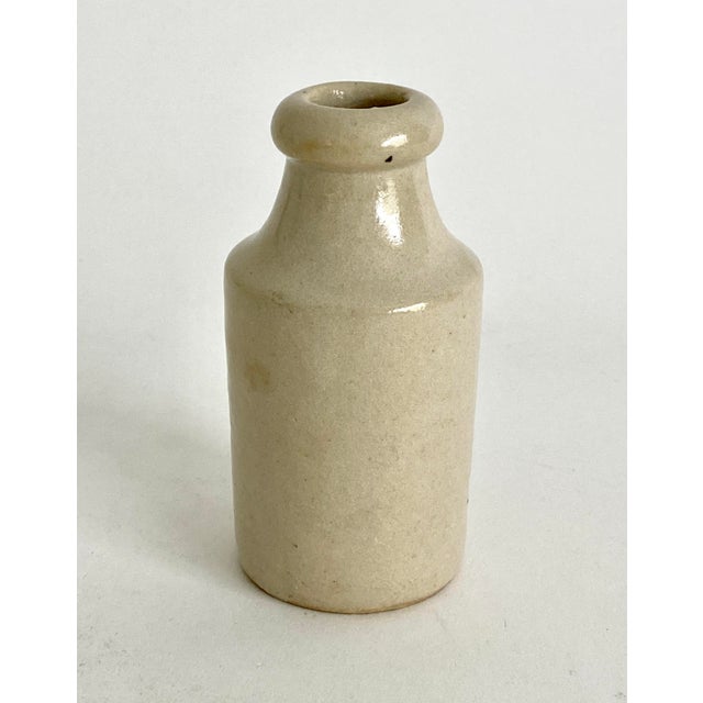 This small stoneware bottle has an imprint on the bottom for Mercury Boureon Brothers Paris 500. What a great piece of...