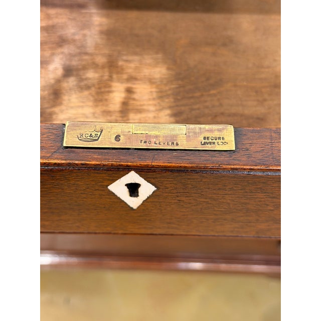 This is a beautiful 19th Century English 4 drawer chest from England. Its traditional brass Hepplewhite drop pulls and...