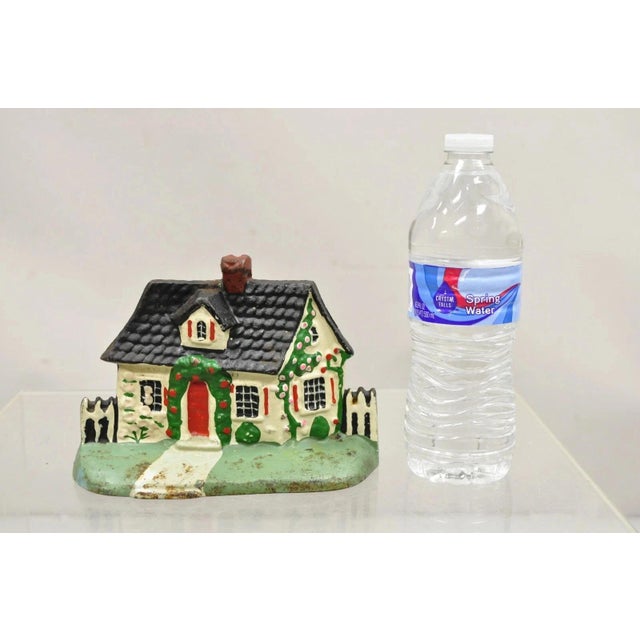Antique Victorian Cast Iron Figural Traditional Cottage House Painted Door Stop. Circa Early 20th Century. Measurements:...