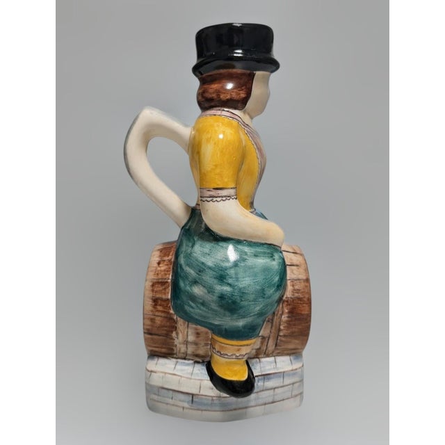 An expressive hand-painted Portuguese ceramic character jug crafted by the famed Fábrica Sant'Anna factory in Lisbon....