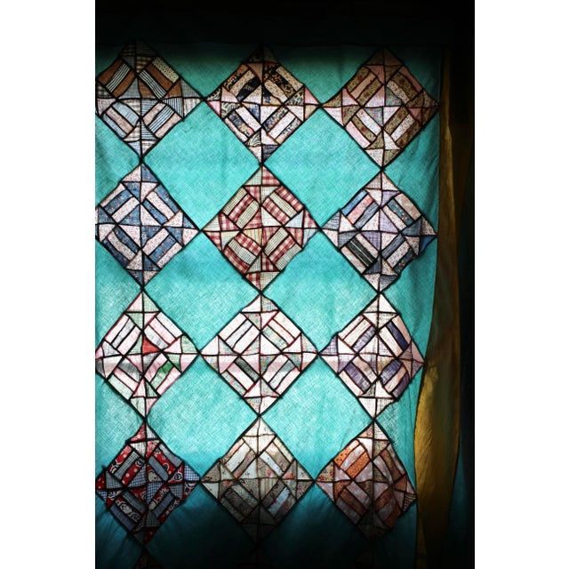 Wonderful quilt top in an aqua or turquoise base with yellow accents. Patchwork in a variety of colors and fabrics from...