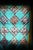 Wonderful quilt top in an aqua or turquoise base with yellow accents. Patchwork in a variety of colors and fabrics from...