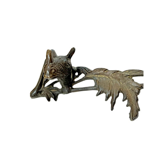 Unusual rhino head bronze coat or hat rack. Three charming rhino heads create the pegs to hang coats or hats on. Perfect...