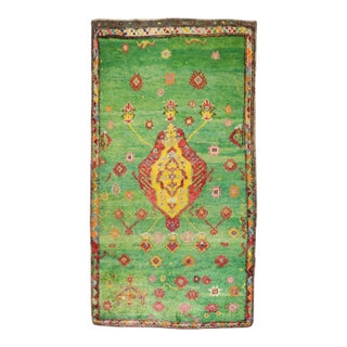 Zabihi Collection Vintage Bohemian Green Turkish Tulu Rug - 5'4" x 9'5" For Sale