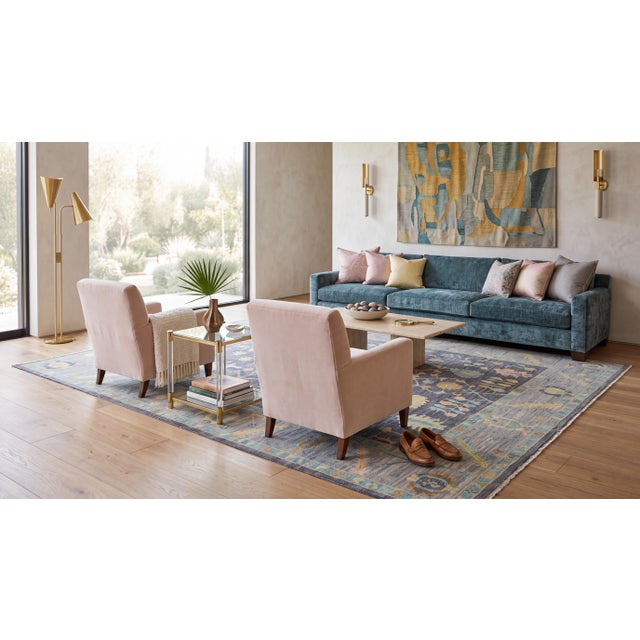 Elevate your space with this exquisite Modern Oushak Style Hand-Knotted Wool Area Rug, designed to bring timeless luxury...