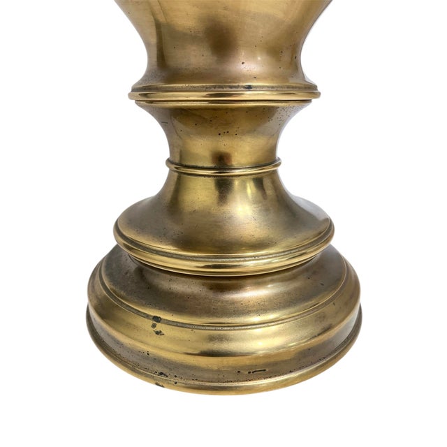 Add a touch of brass to your decor with this quality vintage table lamp by Stiffel from the 1960s. The baluster stem rises...