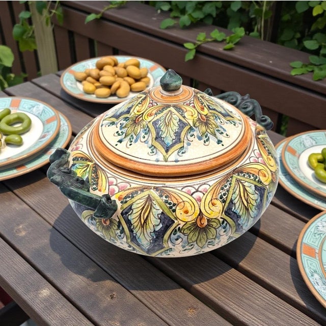 A richly ornamented Sicilian majolica lidded tureen by Erice Ceramica, bearing the “Ericina” mark of the historic hill...
