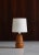 Charming unique table lamp in turned beechwood by a Danish cabinetmaker. Made in the 1950s Denmark. The lamp is equipped...