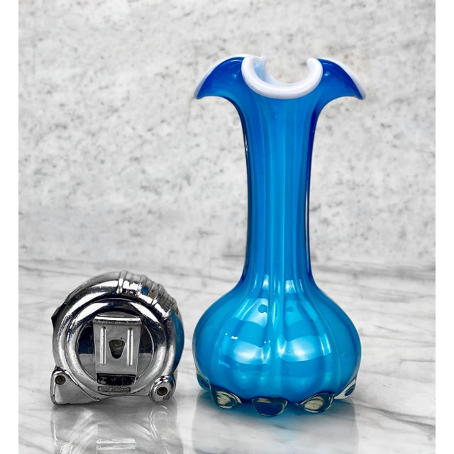 An Atomic Blue Blown Art Glass Sculpted Vase, c. Mid 20th Century. This Vase would look exceptional while displayed in a...