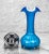 An Atomic Blue Blown Art Glass Sculpted Vase, c. Mid 20th Century. This Vase would look exceptional while displayed in a...