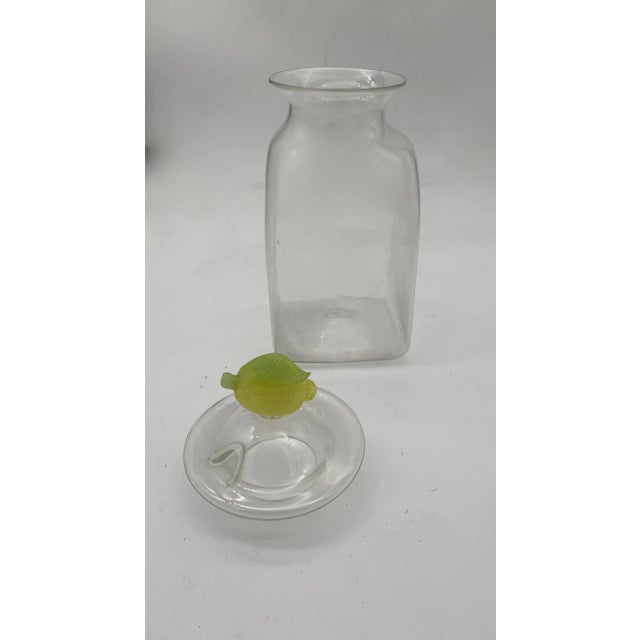 Cesare Toso company, 1960s. Container, vase, sculpture in transparent glass with a square shape and slightly rounded...