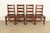 An exceptional set of four antique Mission or Arts & Crafts period solid quarter sawn oak ladder back dining chairs By...
