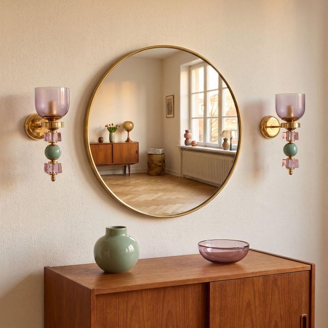 Pair of mid-century modern Murano glass wall sconces, Italy circa 1990s. The pair of Italian sconces is made of pastel...