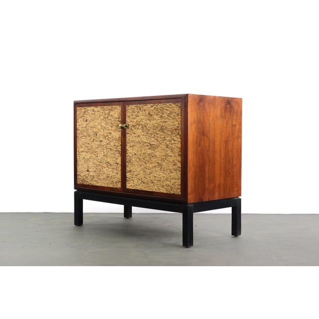 Mid century vintage Founders Furniture Walnut Sideboard / Credenza with brass pulls.The door have been done in a cork....