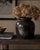 A beautifully preserved example of American utilitarian stoneware, this substantial storage jar features the deep,...