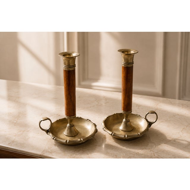 Elegant and rare pair of vintage chamber candlesticks featuring a refined Mid Century Modern design Each piece is a...