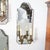 Beveled mirror and cast brass two-arm sconces For Sale - Image 10 of 12