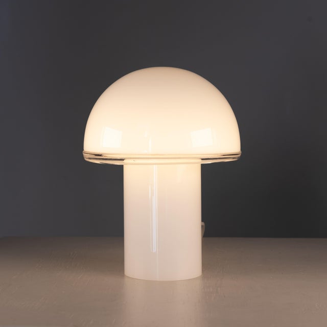 Designed by Luciano Vistosi in 1978, the Onfale table lamp is an iconic example of Italian lighting design. Crafted...