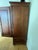 Raised panel doors, edged in ribbed trim and bun feet. The interior is functionally equipped with a TV punch-out, a deep...