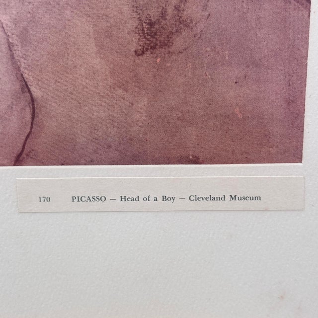 Museum-issued print after Pablo Picasso, Head of a Boy (1905), issued by the Cleveland Museum. This piece is...