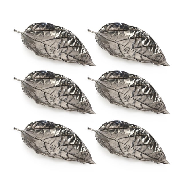 Add a dose of outdoorsy style to your living space. The set of six Osage Orange Leaf Trays make charming decorative...