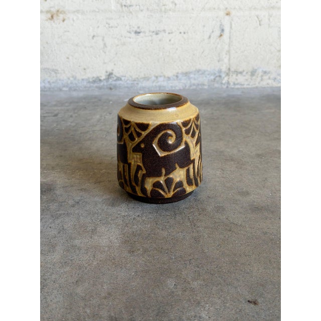 Vintage 1960s Danish Mid-Century Modern ceramic vase showcases a striking relief pattern from the historic Michael...