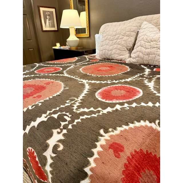 This gorgeous antique suzani is the most versatile textile. It can be used as a bed linen, to upholster a headboard or an...
