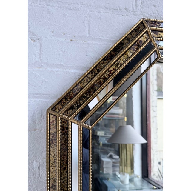 Large Mid-Century decorative wall mirror in the style of LaBarge. This Venetian style octagonal shaped dimensional mirror...