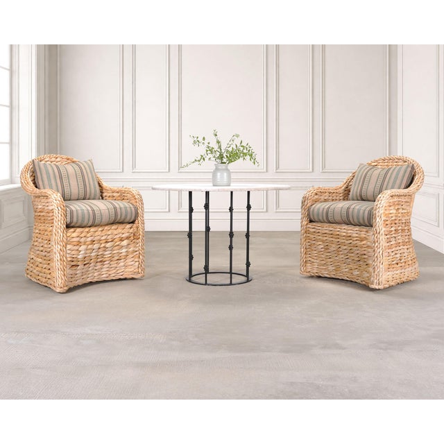 An organic modern set of four Joshua Tree dining chairs after the original by Ralph Lauren for E.J. Victor. The "Isla"...