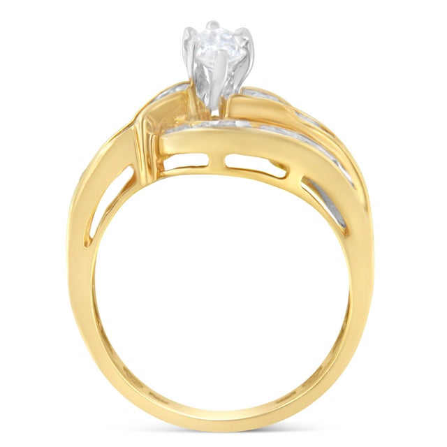 A central marquise cut diamond is the main feature of this elegant design that also features a bypass band crafted in 14...