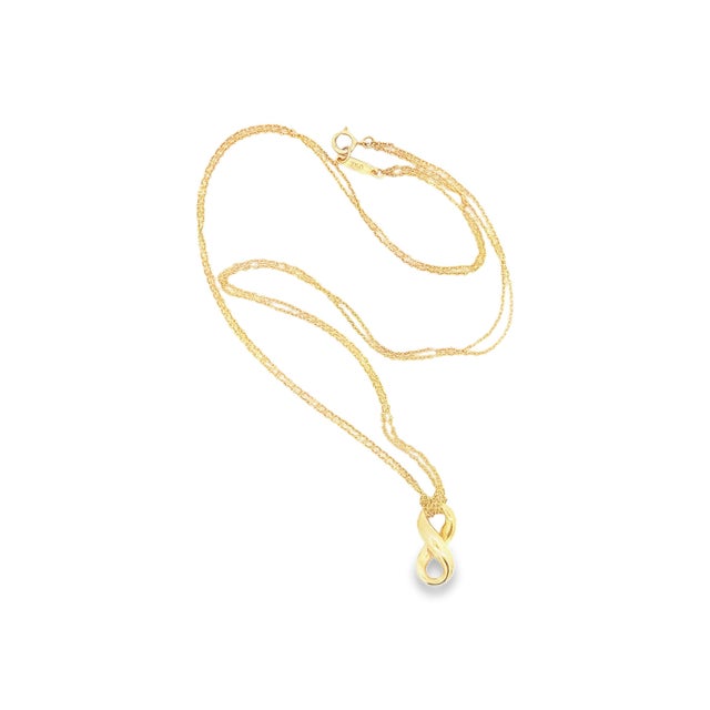 Tiffany and Co. Late 20th Century 18k Gold Tiffany & Co. Infinity Necklace For Sale - Image 4 of 4