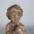 This exquisite set of three antique Italian carved wood figures depicts putti musicians, dating to approximately 1920....