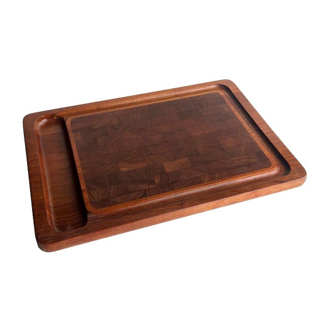 Offered is a mid 20th Century Dansk brand staved Teak wood butcher carving board and charcuterie tray for cheese and...