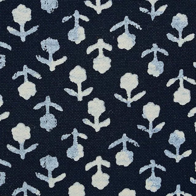 Inspired by traditional indigo resist-dye techniques, this hand-screened, pigment-printed floral is delicately diminutive...