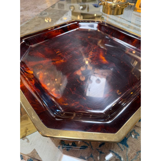 Elegant vintage octagonal serving tray featuring a rich amber-brown tortoiseshell-style finish and brass-tone metal...
