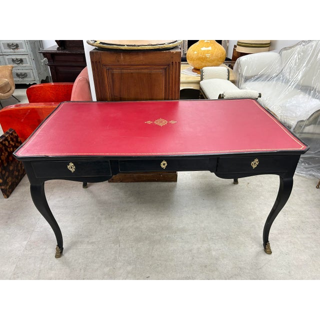 French Maison Jansen Attributed Louis XVI Style Ebonized Desk. We offer a gorgeous antique French Louis XVI style ebonized...