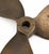 Vintage bronze three-blade marine propeller with original patina and authentic wear. A sculptural industrial maritime...