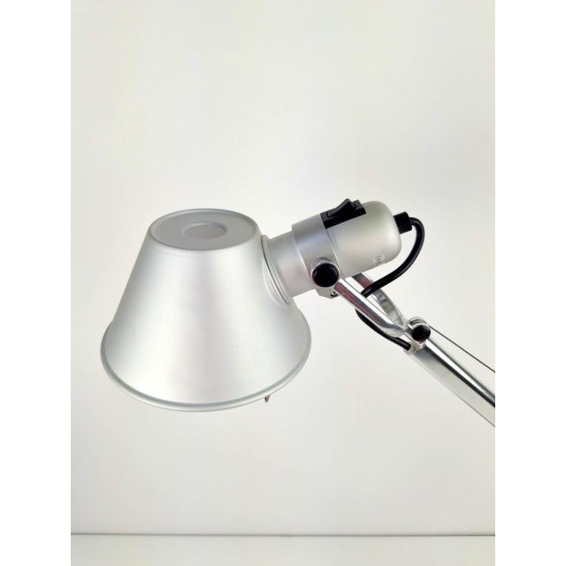 Artemide tolomeo mini desk lamp, by michele de lucchi and giancarlo fassina for artemide. the artemide tolomeo desk lamp—a...