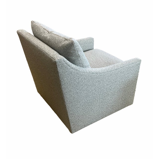 The Ruby Swivel Chair offers a refined balance of sculptural form and everyday comfort. Fully upholstered in luxurious...