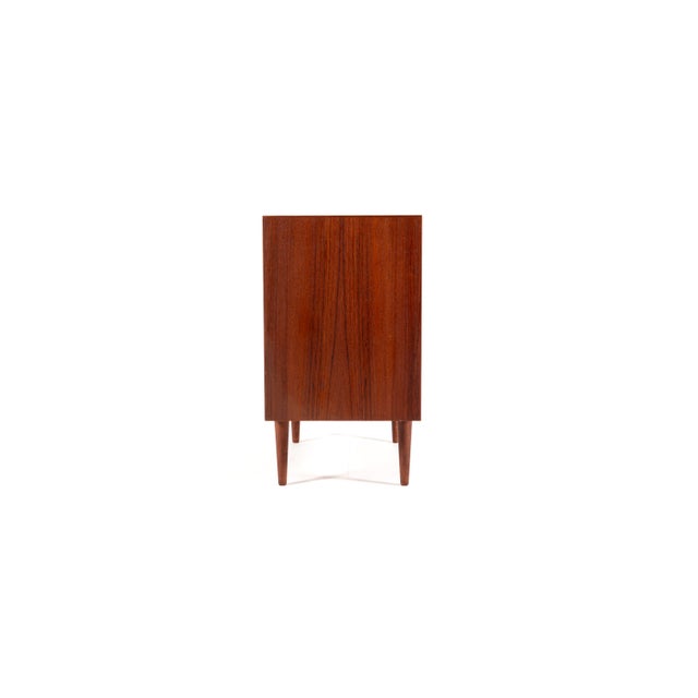 A beautiful and compact Danish cabinet from the 1960s, made by Sejling Skabe as confirmed by the original label on the...