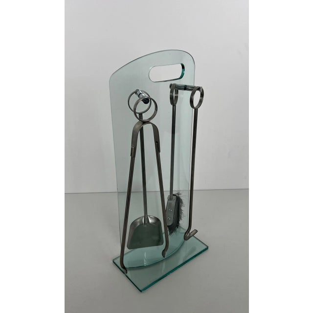 This very beautiful fireplace stand with an elegant design is made of tempered glass and brass with brushed aluminum...