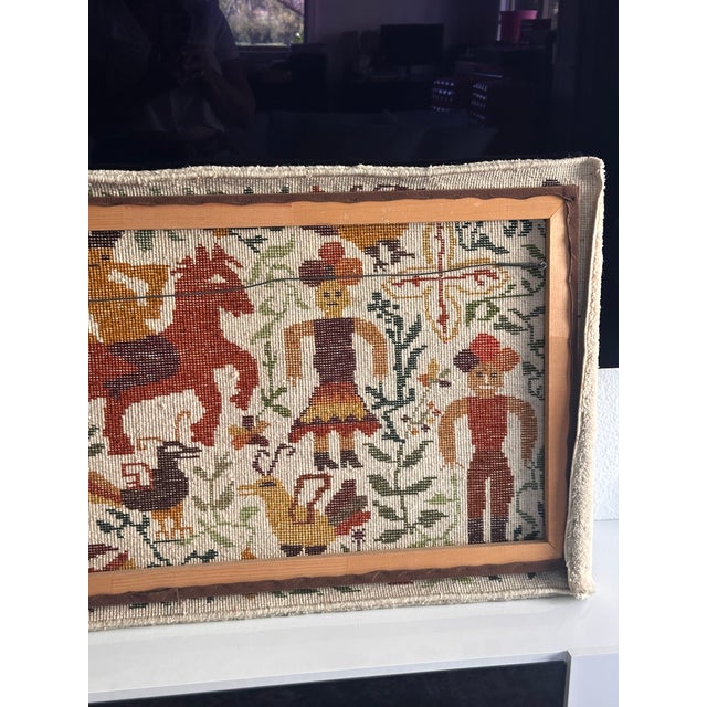 This is a magnificent vintage Olga Fisch Ecuadorian folk art rug. This handwoven textile features a richly colored and...