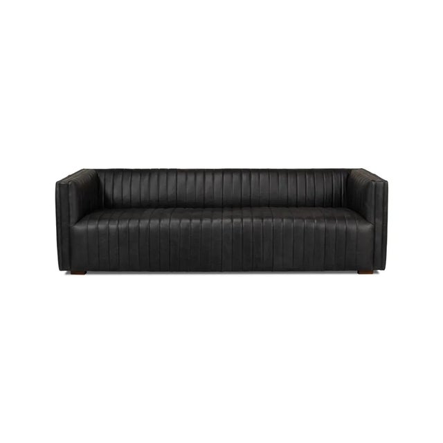 The eloquent sofa has a unique modern channeled leather design to the backrest, seat, arms and rear. At 96 inches long the...