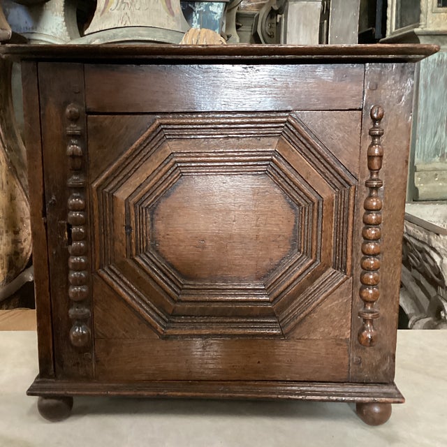 A hand-carved wood spice box with octagon in relief on the front. This wonderful spice box is from the early 19th century,...