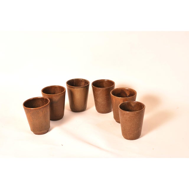 This set of stoneware coffee cups from the Digoin factory embodies bohemian aesthetics with timeless elegance. The clean...
