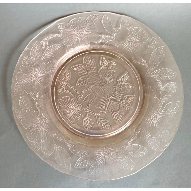 Here is a lovely set of seven MacBeth-Evans Dogwood luncheon plates crafted in delicate pink Monax Depression glass...